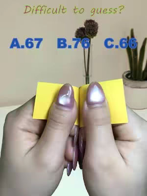 An overhead shot features two hands holding open a small yellow notepad, revealing yellow pages. Above the notepad, three numbers in blue, next to the words 'Difficult to guess?' The background is a soft, blurred interior with a vase of flowers and a potted plant.