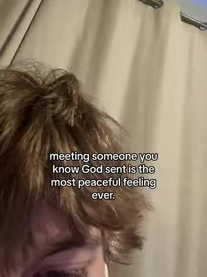 Cover image is a selfie-style shot, focusing on the upper face and hair of a person, with text overlayed. The individual has light brown hair styled to the side, with some of their forehead visible. The background seems to be a light-colored wall or curtain. The image is composed with the person's face taking up a significant portion, and text overplayed in a clean, white font appearing over the person's face.