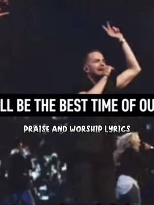 The cover image shows a live stage performance with a man singing into a microphone, his arm raised. Overlayed text indicates the song title and additional text at the bottom that describes "Praise And Worship Lyrics". The background is dark and the lighting suggests a concert or event setting.