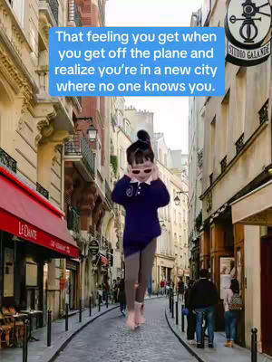 The image shows a young person walking down a cobblestone street between tall buildings. Text overlays in a blue box state, "That feeling you get when you get off the plane and realize you're in a new city where no one knows you."