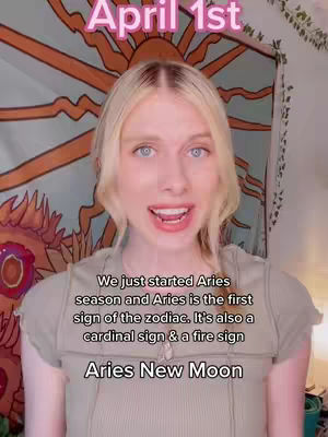 A woman with blonde hair and blue eyes is speaking to the camera. Behind her is a tapestry with an orange sun design. Text is overlaid, including the date and information about Aries season.