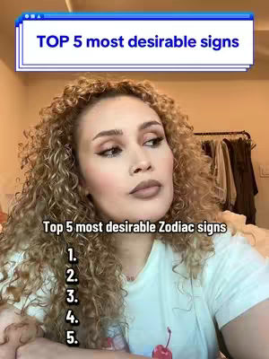 A woman with curly blonde hair looks up pensively, a graphic overlay reading "TOP 5 most desirable signs" is above her, with a list numbered 1-5 below.