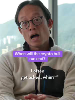 A man with glasses is speaking directly to the camera. Text appears on the screen with questions about the crypto bull run.