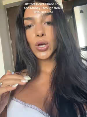 A selfie-style shot of a woman with long, dark hair, looking at the camera with an open mouth. Text overlays the image.