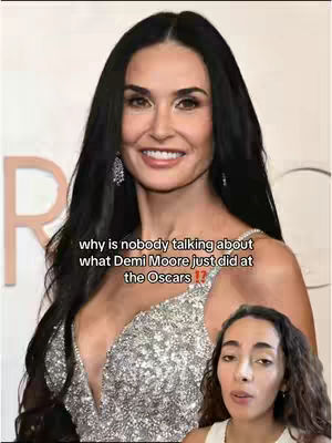 The cover image is a vertical shot featuring Demi Moore, the primary focus, against a neutral background. She is positioned centrally, from the chest up, smiling at the camera with long, dark hair framing her face. She's wearing a sparkling, intricately designed dress with a deep neckline. Overlaid on the image are the hook text and a smaller inset video of the creator in the lower right, with a similar neutral background.