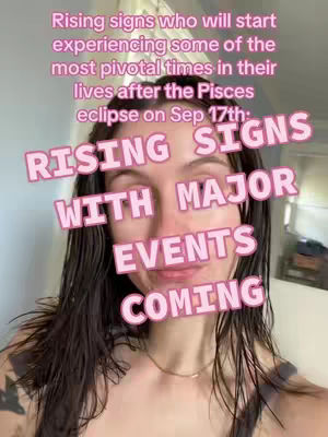 A woman with dark hair is the central focus, her face positioned towards the camera. Overlaid on her face are pink, stylized text graphics. The background is softly lit, suggesting an indoor setting, possibly a home environment.