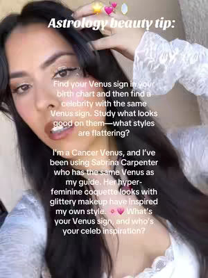 A woman with dark hair is centered in a selfie-style shot, looking towards the camera. She has makeup, including glitter around her eyes, and has a relaxed pose with her hand near her hair. Text overlays explain it is an Astrology beauty tip.