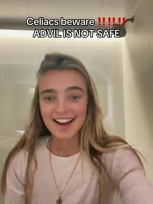 A young woman with blonde hair and a white shirt smiles directly at the camera. Text overlays the top, warning people with Celiac disease that Advil is unsafe.