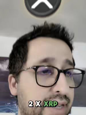 A selfie-style video cover shows a man with dark hair wearing glasses and a beard, with a stylized XRP logo above his head.