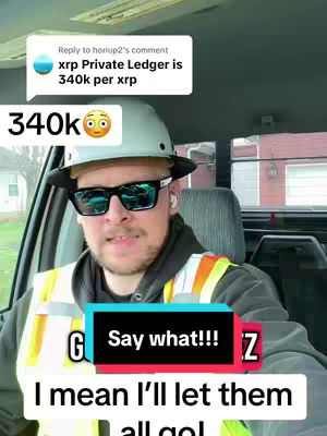 A man in a truck is filming himself. He wears a hard hat and sunglasses. Text overlays include a comment and prompt, 'Say what!!!', and 'I mean I'll let them all go!'