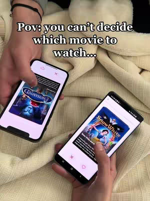 Two hands hold smartphones displaying movie apps while lying on a light-colored cloth. Text overlay on the image.