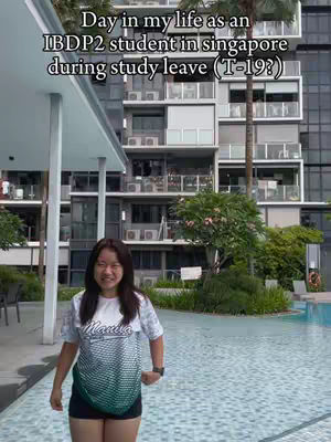 A young woman stands in front of a building and a swimming pool, smiling at the camera. Text overlays the image.