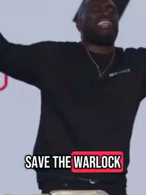 A man in a black hoodie is shown in an excited pose with arms outstretched. Below him, text on a red background reads Save the Warlock.