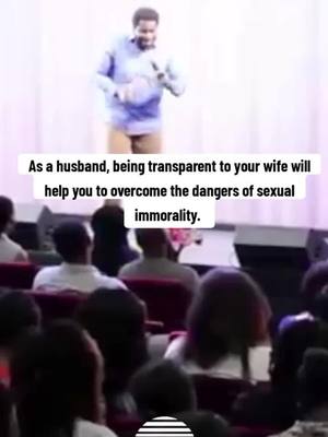 A man is speaking to an audience in front of a white background with text overlaid.