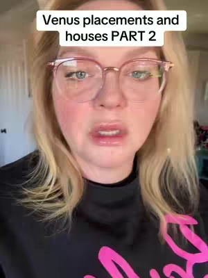 A close-up shot of a woman with blonde hair and glasses looking directly at the camera. Overlay text at the top says 'Venus placements and houses PART 2'. The woman appears to be speaking, possibly in a vlog style, with a neutral expression.