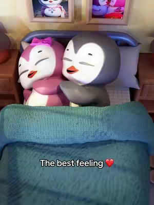 The cover image shows two penguin-like cartoon characters cuddling in bed, the two are surrounded by a blue blanket. Above the bed are two framed pictures.