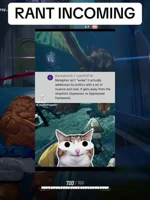 The cover features a vertical layout with a screenshot of a video game overlaid with various elements. At the top, a white rectangle contains the text "RANT INCOMING." Beneath this, a screenshot from the game shows a scene with characters and environmental details. A smaller screenshot of a social media post is placed over the game footage. It shows a comment regarding the politics of a game. A cat image with large black dots for eyes is placed over the original screen shot. Below it is a progress bar, and a bar with 700/700 text. The color palette is dominated by blues, greens, and browns of the game environment, contrasted with the white and black elements for emphasis.