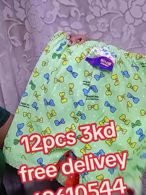 The cover image displays a pair of green patterned shorts. The shorts have a light green base with a pattern of yellow and blue bowties scattered across them. The text overlayed on the image says " 12pcs 3kd free delivey 69610544" in red letters with a white outline.