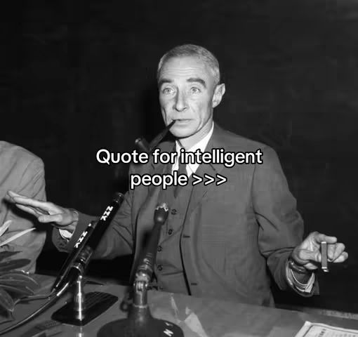 Black and white photo featuring a man in a suit at a podium speaking into a microphone. Text overlayed reads: "Quote for intelligent people >>>".