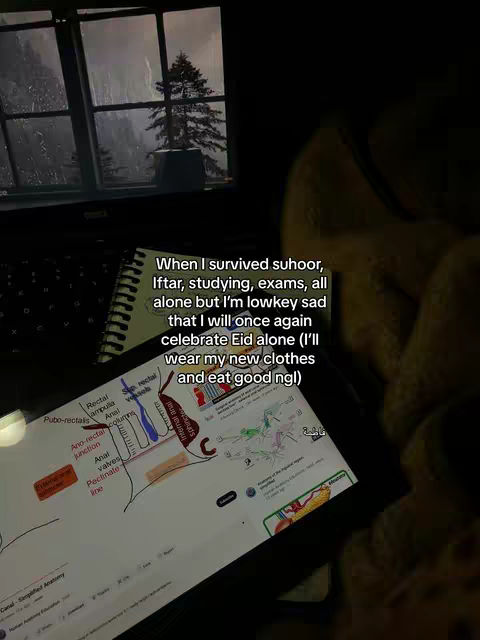 The cover image shows a person studying at a desk with a laptop and notebook. The background includes a window with a blurred outdoor scene. The person appears to be writing notes on a notebook and has a tablet on the desk with anatomical diagrams visible.