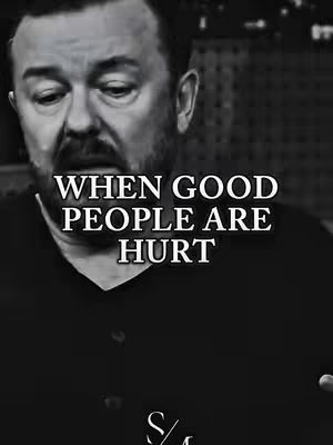 Black and white image featuring Ricky Gervais with text overlayed. The image is a medium shot, focusing on his face and upper chest. Gervais is looking down with a serious expression. The text overlay reads, 'WHEN GOOD PEOPLE ARE HURT'. The background is blurred, suggesting a simple setting. The overall tone is serious and contemplative.
