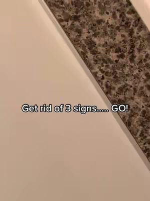 The image shows a diagonal split; the top right side is a flecked, brown surface, while the bottom left is a plain tan surface. Overlaid on this is the textual hook "Get rid of 3 signs..... GO!" in a casual font.