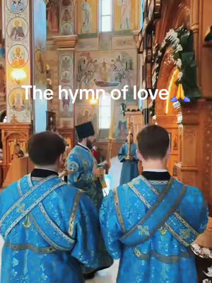 An interior shot of an Orthodox church showing the altar and several men in religious robes in the forefront. A text overlay reads 'The hymn of love'.