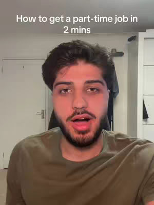 The cover image features a man with dark hair and a beard, looking directly at the camera with an open mouth. The background is a room with a door and a white cabinet. The text overlay says 'How to get a part-time job in 2 mins'.