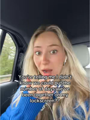A young woman with long blonde hair is close to the camera, appearing surprised. She is inside a car, with the window and background slightly blurred. Text overlays explain the surprise.