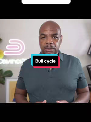 A man with a bald head wearing a dark green polo shirt is standing in front of a blurred setting. A rectangular text overlay that says "Bull cycle" is at the front and center of the image.