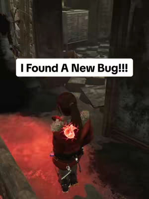 The image shows an in-game screenshot of a video game character positioned in a dimly lit, enclosed space. The character appears to be a female figure, viewed mostly from the back, with a ponytail and dark clothing. Overlaid on the image is a white box containing the text, 'I Found A New Bug!!!'