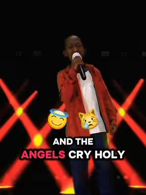 A medium shot of a young Black man singing into a microphone on a stage. The background is dark with red stage lights. The image has emojis and text overlays.