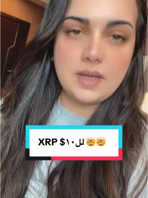 The image is a selfie-style shot featuring a woman against a casual indoor background. She has long, dark hair and is looking towards the camera. The image is framed with a rectangular text overlay at the bottom that is black with white and light blue text.