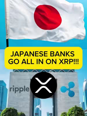 The cover image features a composite design with a Japanese flag at the top, a yellow rectangular banner in the middle, and a building facade with a crypto symbol at the bottom. The flag has the iconic white background and red circle. The yellow banner contains bold, black text, and below that, the building has the 'ripple' logo and then below that a larger black circle containing the white XRP symbol. A blue sky serves as the background.