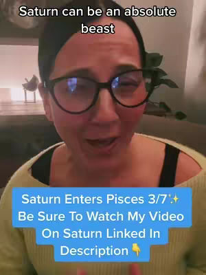 A woman with glasses is centered in the frame, speaking with a backdrop of a room and plant life. Text overlays provide key information. The composition is standard for a selfie-style video, with a medium shot that focuses on the woman's face and upper body.