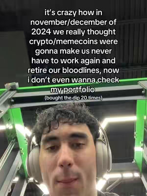 A selfie-style video cover image. The main subject is a young man wearing headphones, positioned in the center of the frame. The background is slightly out of focus but appears to be an indoor space using various green and black gym equipment. The overall composition is a straightforward, casual selfie.