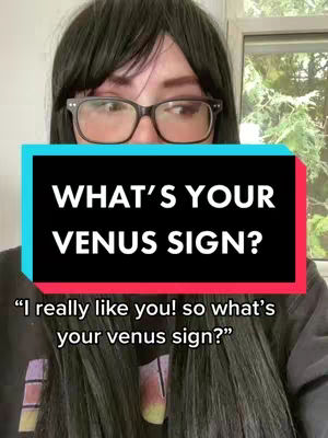 The cover image has a woman in the foreground looking slightly to the left. She's wearing glasses and a dark wig with bangs. Behind her, a sign over her head is visible. The sign shows what appear to be the words "WHAT'S YOUR VENUS SIGN?" The sign itself is a rectangle with a black background and a teal outline. Below the sign, at the bottom of the frame, a smaller text box reads "I really like you! so what's your venus sign?"