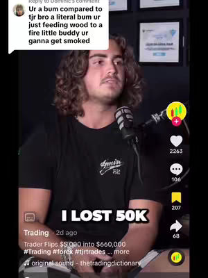 A man with curly hair, wearing a black t-shirt and a microphone. The text overlay reads I LOST 50K.