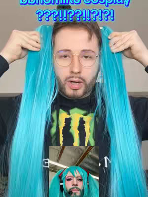 A man with glasses is holding up two long, bright blue wig strands, with a smaller image of himself wearing a similar wig in the center.
