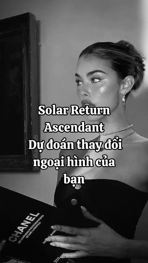 A black and white image of a woman looking to the side, with text overlayed. The woman, with her hair pulled back, wears a black top with a necklace. The background includes a picture and what looks to be a wall or closet.