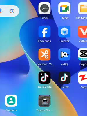 The image shows a mobile phone's home screen arranged with app icons. The background consists of blue and white abstract shapes. The icons include social media apps (Facebook, TikTok), utility apps (Clock, File Manager), and other applications labeled "YouCut - Vi...", "vidIQ", and "Toyota Car".