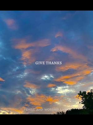 A serene image of a cloudy sky at sunset. The sky is filled with layered clouds, colored with hues of blue, orange, and yellow. At the bottom of the image, a dark silhouette of trees and foliage can be seen. White text overlays the image, displaying the words 'GIVE THANKS' in the center, while a smaller text at the bottom left reads 'PRAISE AND WORSHIP LYRICS'.