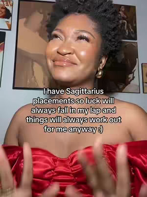 The cover image features a woman with dark, curly hair and warm skin. She has a slight smile and looks upwards, wearing large gold earrings and a red, off-the-shoulder top. Text overlays at the bottom of the image.