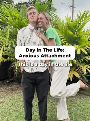 A couple stands embracing in front of lush green tropical plants. A text overlay provides context.