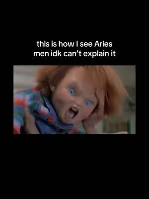 The image features a close-up of the doll Chucky, his face contorted in a grimace, showing wide blue eyes and an open mouth as if screaming. Text overlays appear above the image against a black background