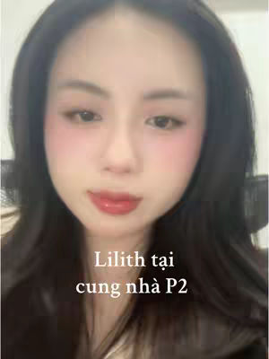A close-up selfie features a person with long, dark hair. The person's face is centered, with fair skin, rosy cheeks, and red lipstick. Text in white font is overlaid on the bottom portion of the image.