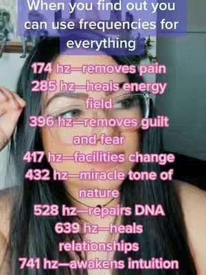 Close-up shot featuring a woman with the text overlayed on the top and the middle. The woman has dark hair, glasses, and is looking towards the camera in a close-up. The image is slightly blurred, with a focus on the woman's face. The overlay text are lines starting with frequency values.