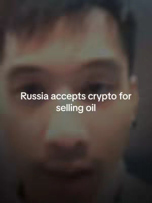 The cover image is a blurred selfie of a man's face. Superimposed over the face is white text that reads, "Russia accepts crypto for selling oil." The overall composition is simple, with the text layered over the blurred image and the photo itself having low contrast and limited detail.