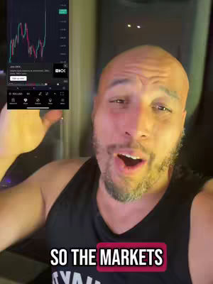 A bald man in a black tank top is centered in the frame against a blurred background. He has a surprised expression with his mouth open, and his arms are gesturing. A smartphone screen displaying a stock chart is visible in the top left. A text overlay at the bottom reads "SO THE MARKETS". The overall lighting is warm, and the composition suggests a vlog style.