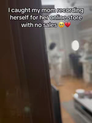 The cover image shows a dark interior with text overlayed. A doorway is visible on the left, and in the distance, a person blurred out. The lighting is dim, and the overall atmosphere seems casual.